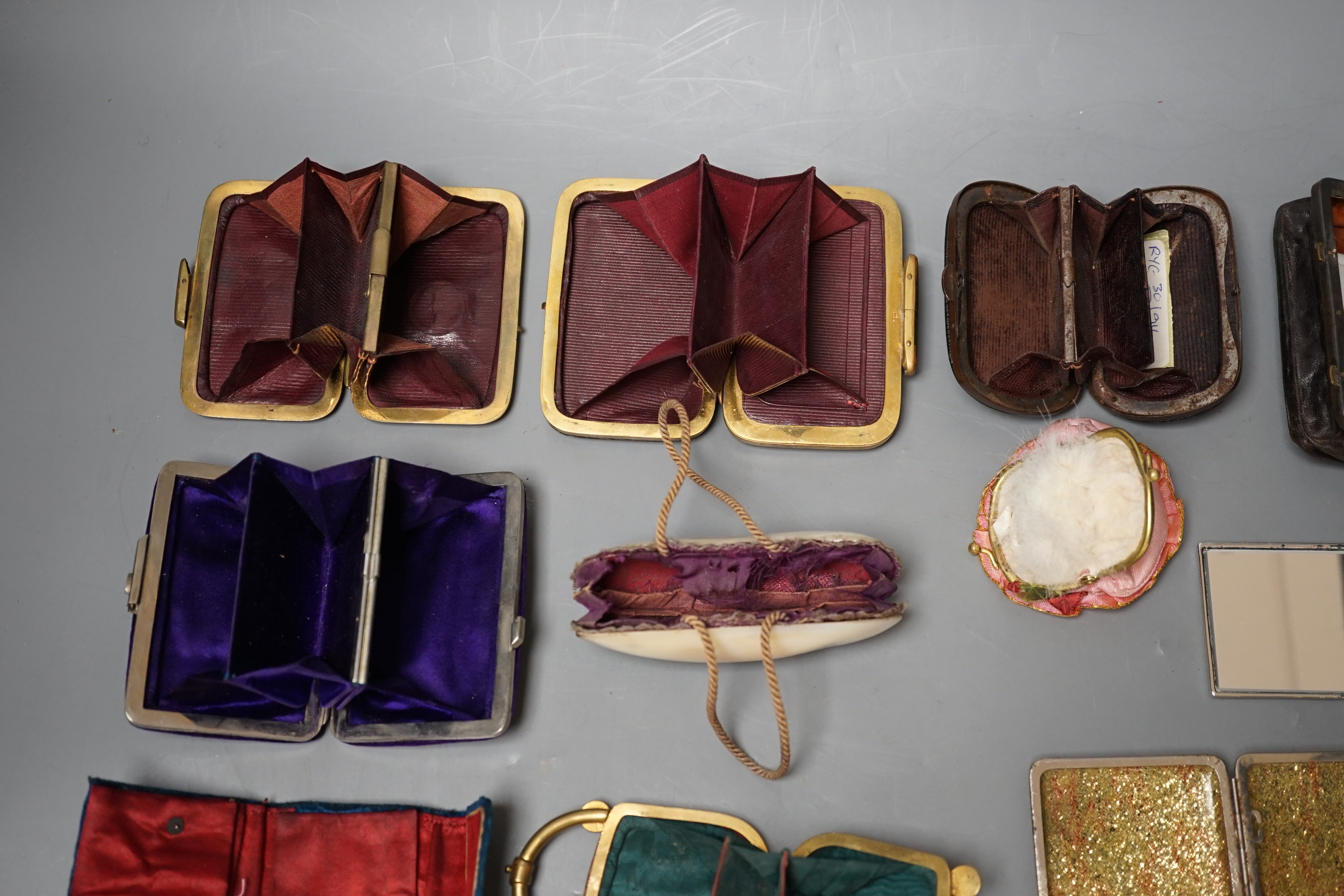 A collection of thirteen 19th century and 20th century ladies purses, one Morocco leather, five other leather purses, a shell purse, velvet embroidered purse and five others